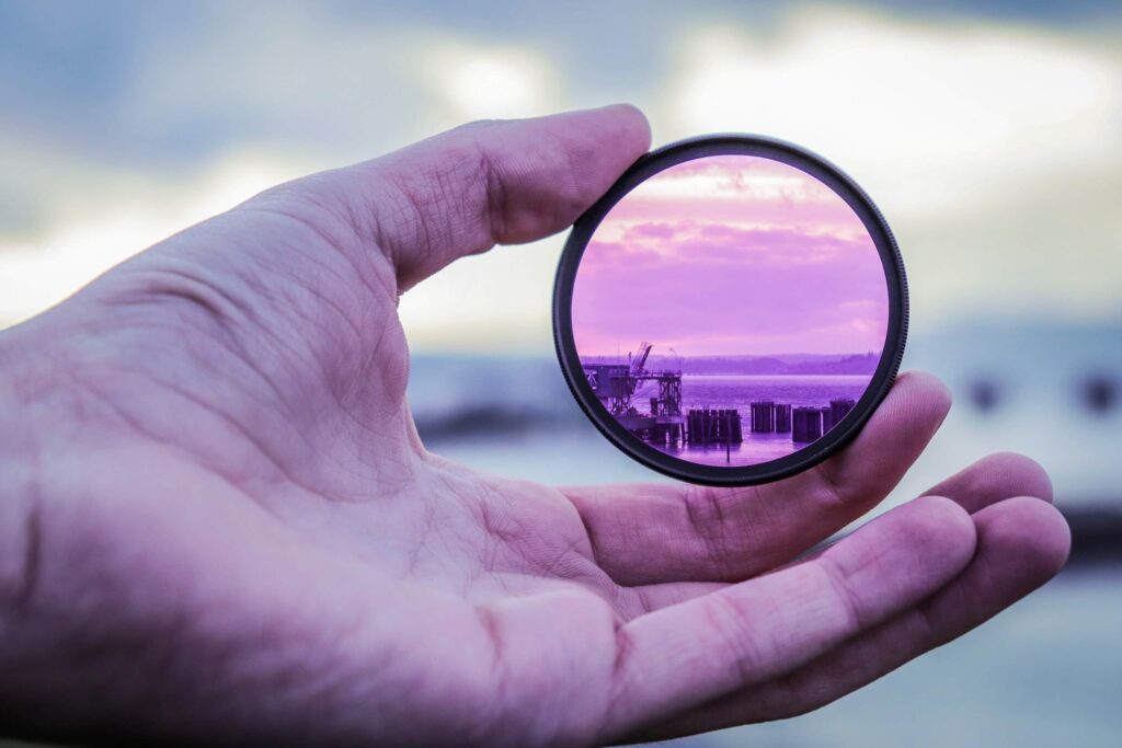 hand holds purple filter