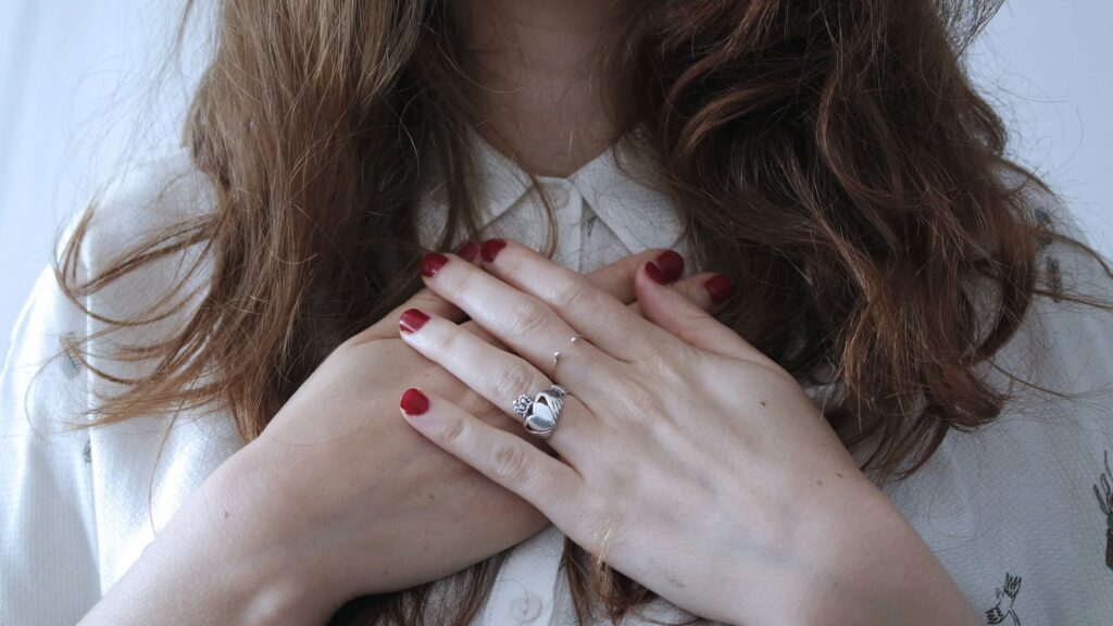 hands heart gesture ring
