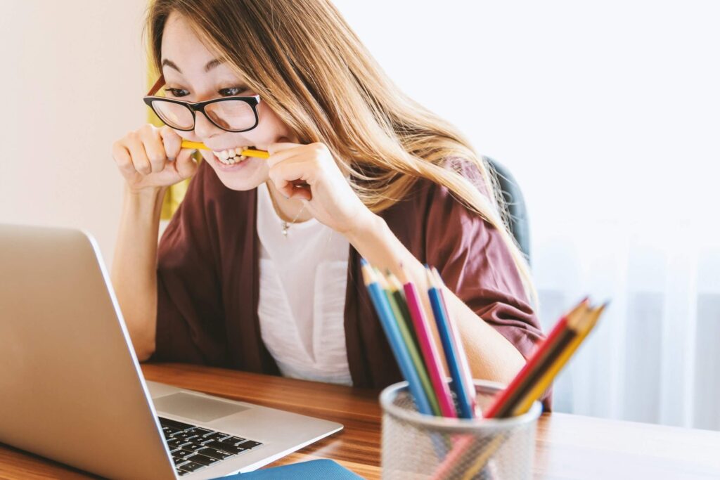 stressed student studying laptop